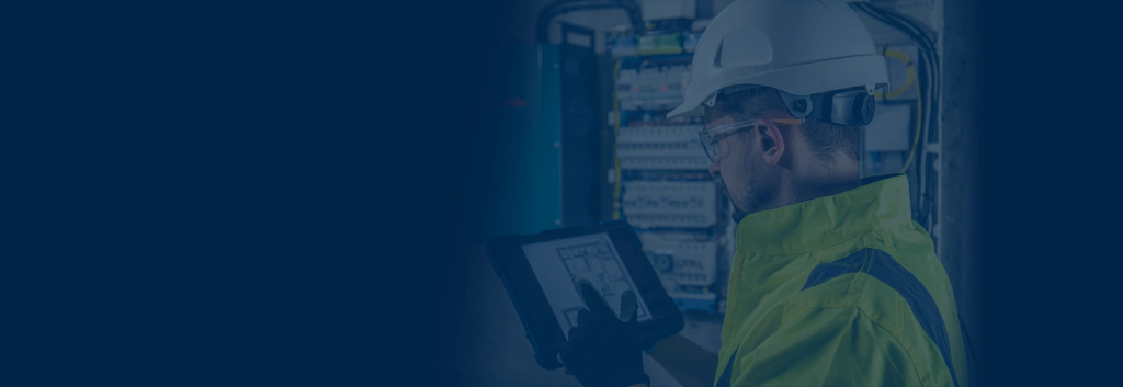 field technician using tablet to maintain asset